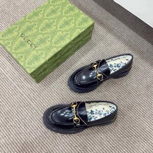 Gucci Women's Black Loafers with Gold Hardware